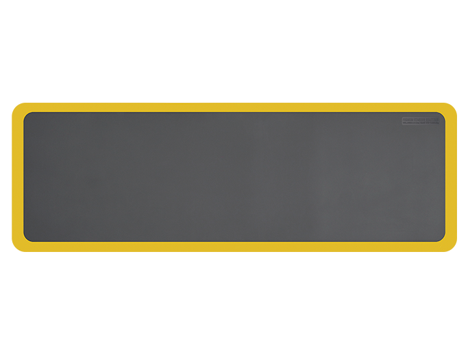 Overhead shot of a gray 6ft by 2ft Supreme mat with yellow safety strip.