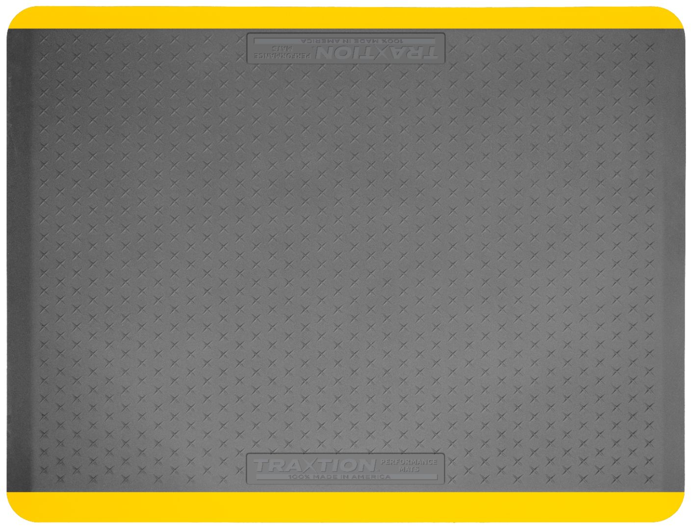 Above view of the top of a gray Traxtion mat with yellow safety strips.